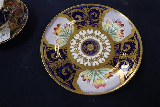 An early 19th century Swansea porcelain tea cup, saucer and plate, c.1820